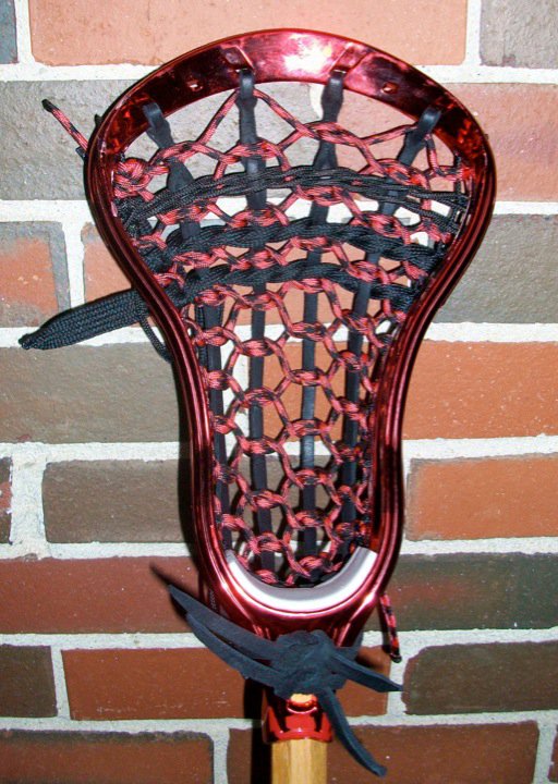 Red Chrome Nike Lakota Lacrosse stick traditional stringing Red Chrome Nike Lakota Lacrosse stick traditional stringing