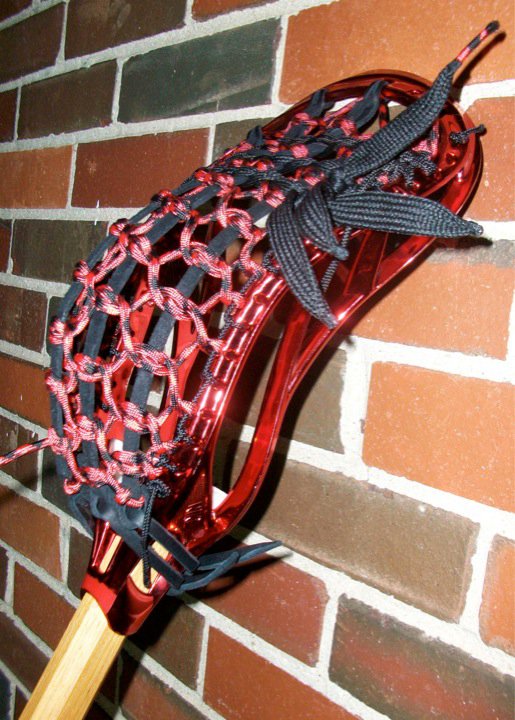 Red Chrome Nike Lakota Lacrosse stick traditional stringing Red Chrome Nike Lakota Lacrosse stick traditional stringing