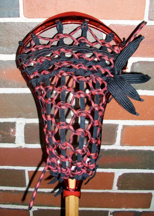 Red Chrome Nike Lakota Lacrosse stick traditional stringing Red Chrome Nike Lakota Lacrosse stick traditional stringing
