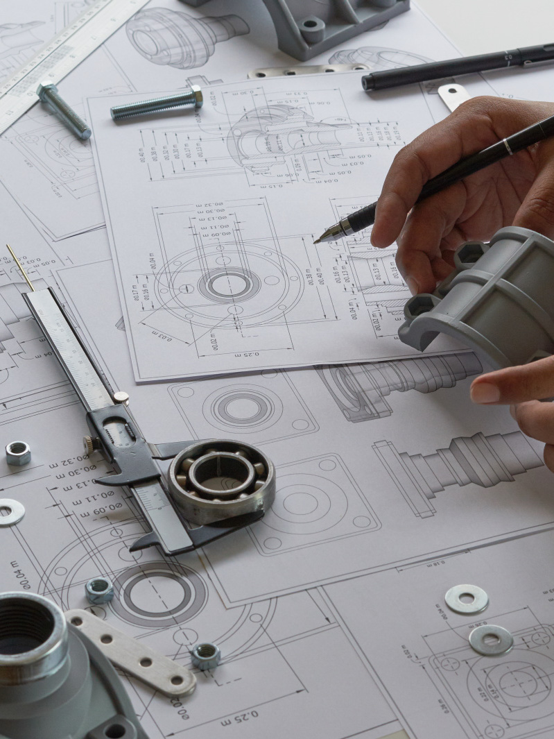 desk with tools and sketches